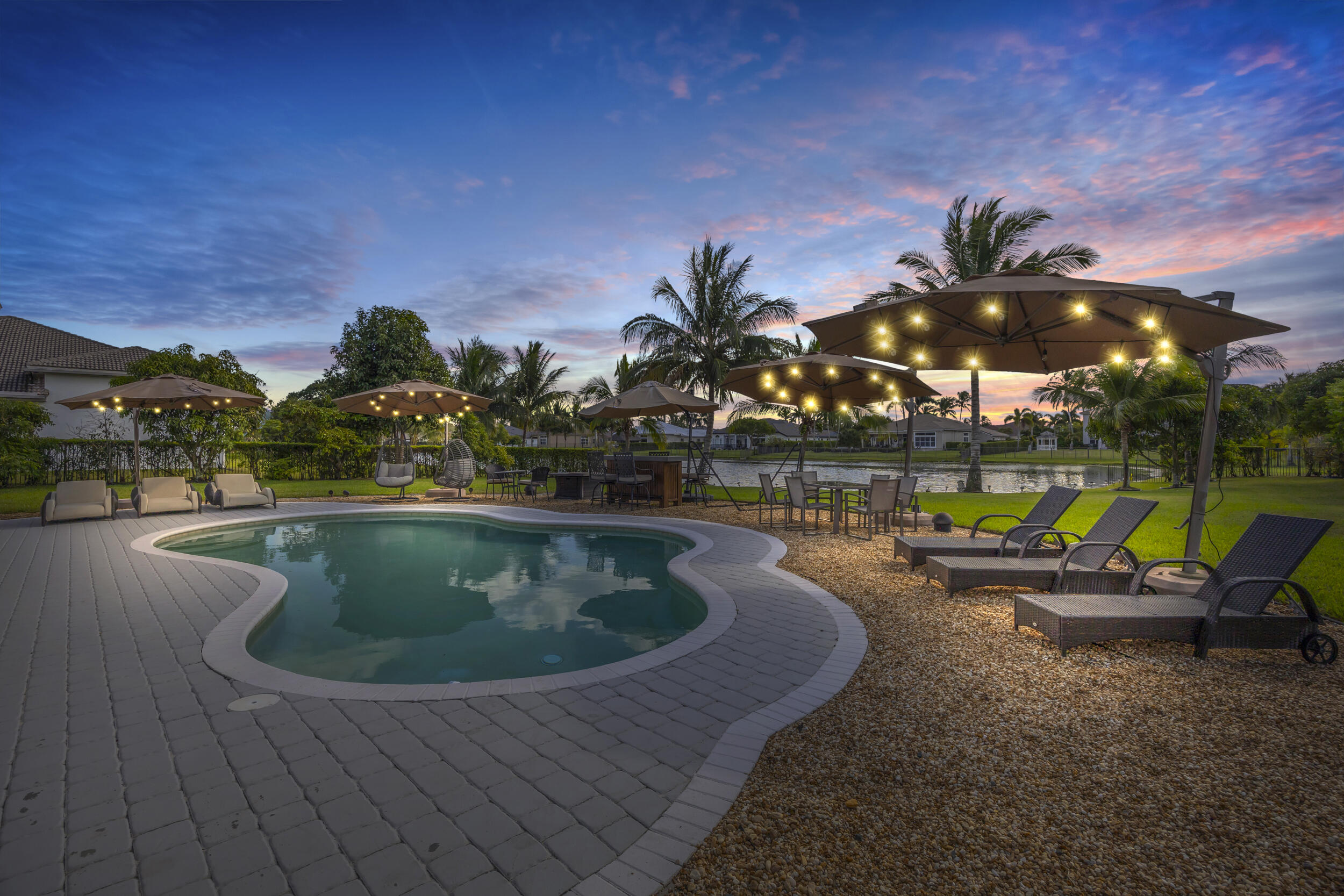 15182 Southwest 35th Street Davie, FL 33331 - Photo 5 of 53 a swimming pool with outdoor seating and yard