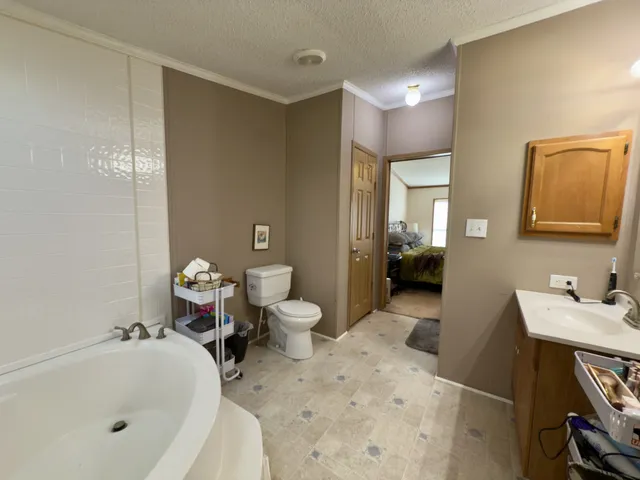 a room with furniture and gym equipment