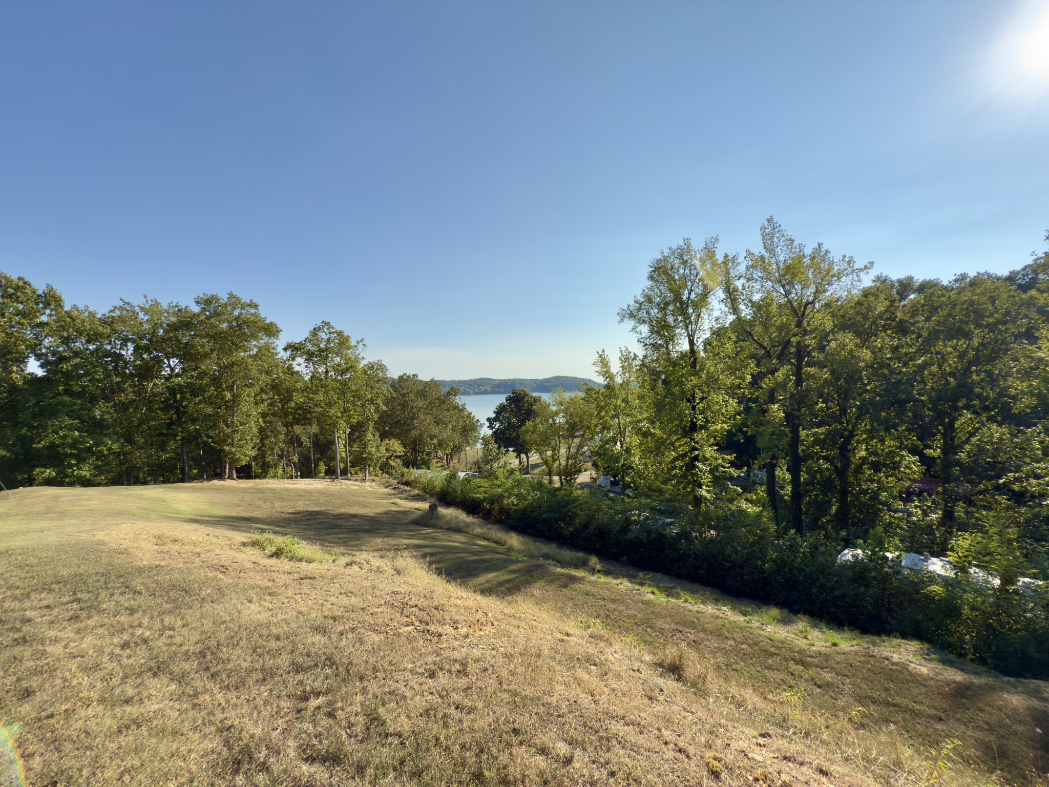 97 Camp Circle Waverly, TN 37185 - Photo 33 of 52 a view of dirt field with trees in background