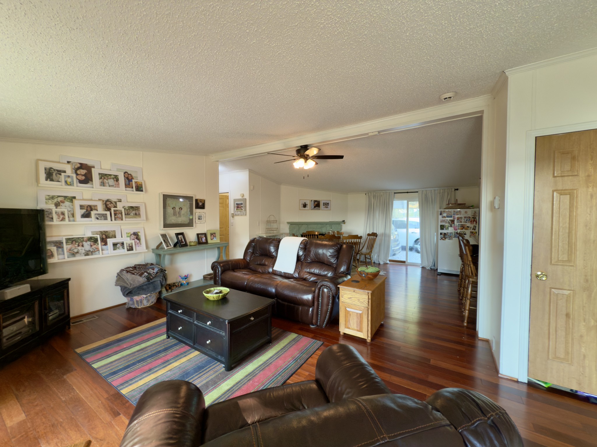 97 Camp Circle Waverly, TN 37185 - Photo 9 of 52 a living room with furniture and a flat screen tv