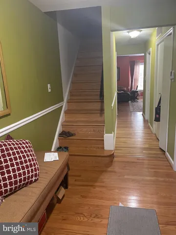 a view of balcony with wooden floor