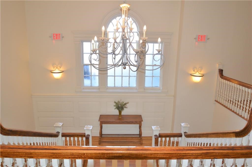 398 Wolcott Avenue, Unit 9 Middletown, RI 02842 - Photo 5 of 33 Top of foyer stair