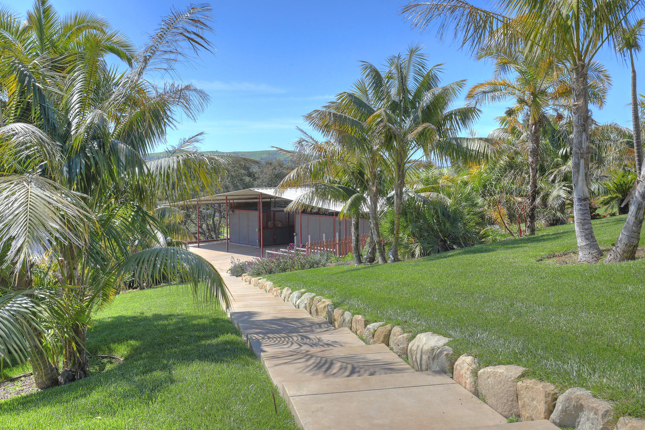 2191 Tularosa Road Lompoc, CA 93436 - Photo 20 of 57 a view of a backyard with a garden
