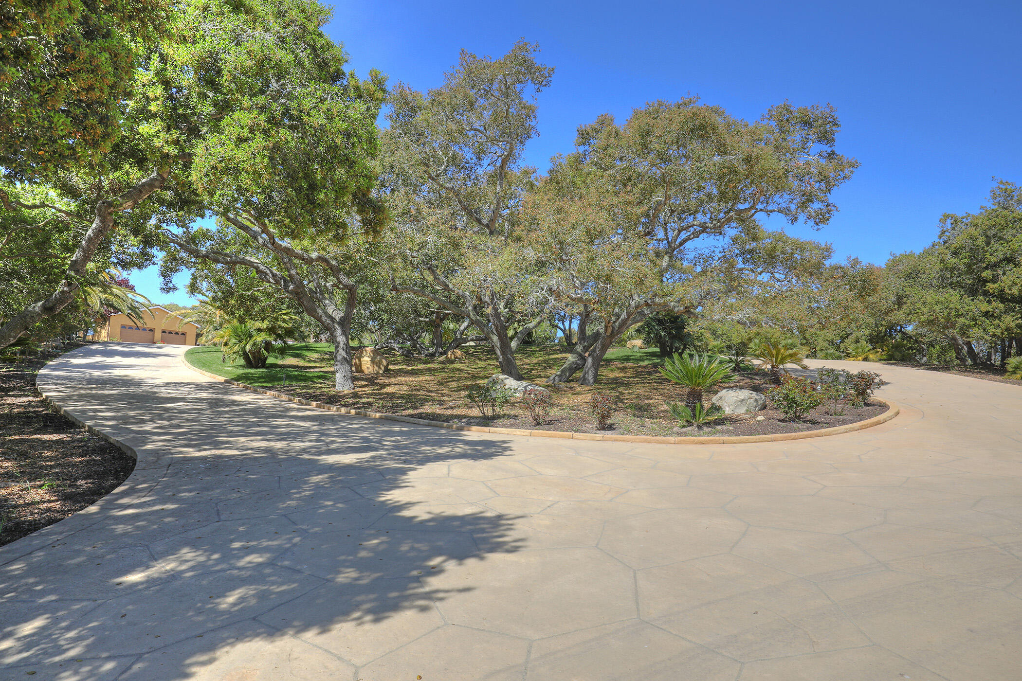 2191 Tularosa Road Lompoc, CA 93436 - Photo 33 of 57 a view of a yard with a tree