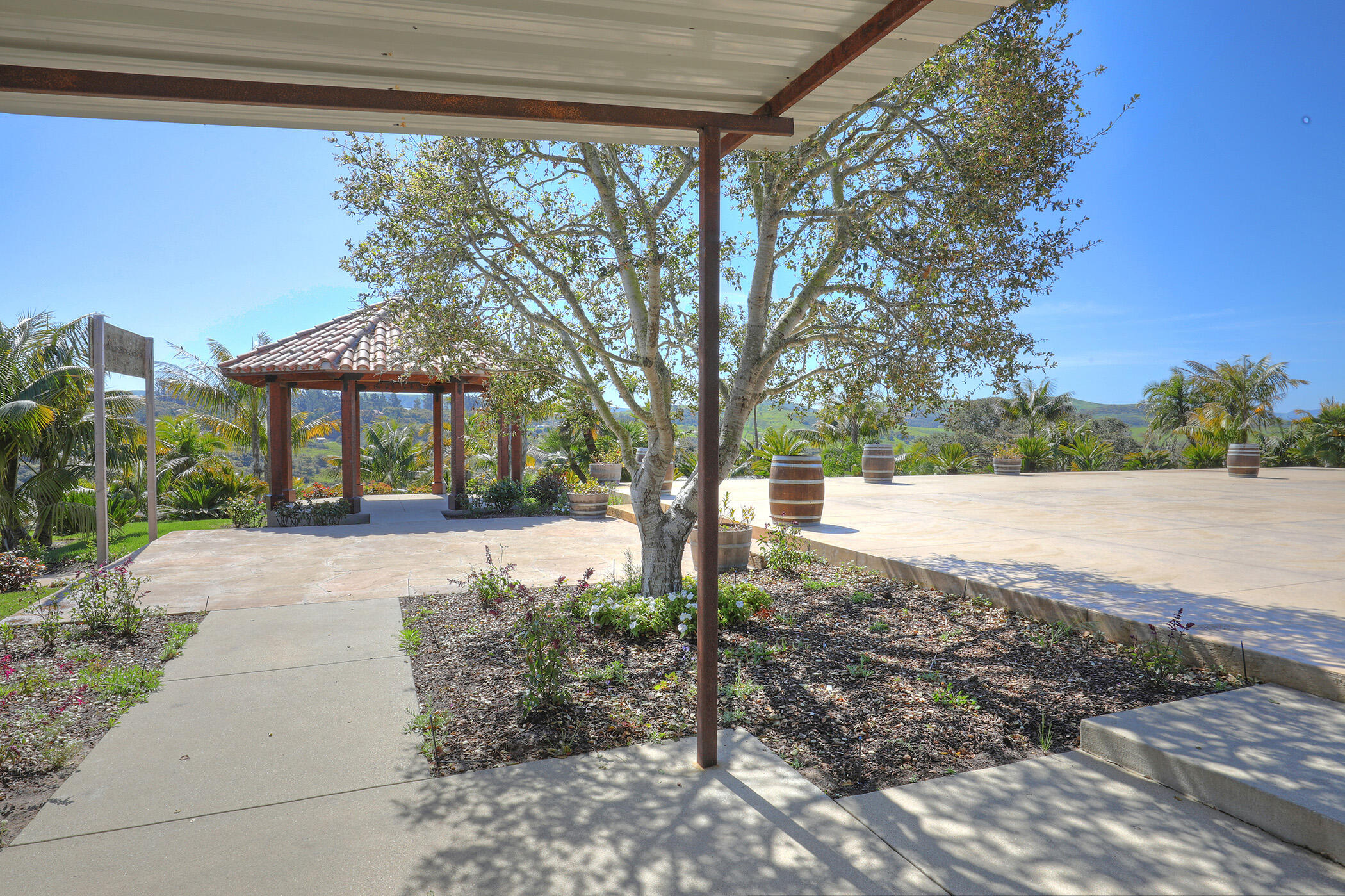 2191 Tularosa Road Lompoc, CA 93436 - Photo 34 of 57 a view of a house with backyard and a tree