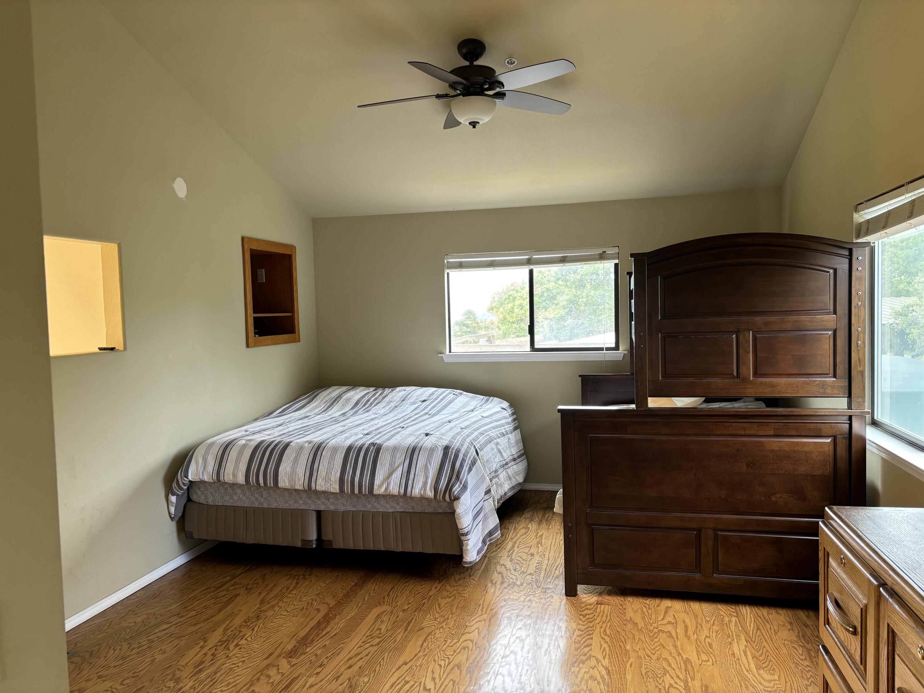 2191 Tularosa Road Lompoc, CA 93436 - Photo 48 of 57 a bedroom with a bed and a chandelier