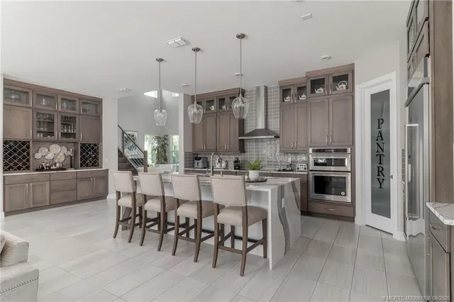 a bathroom with a sink toilet a mirror and shower