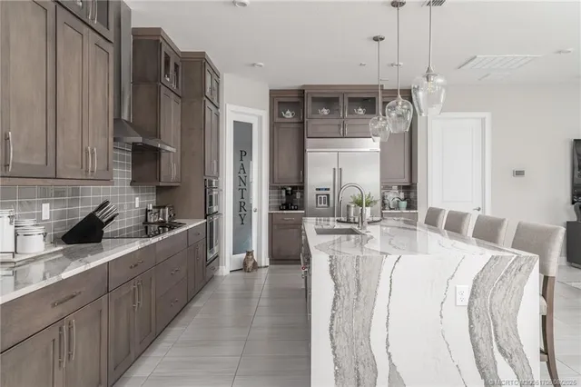 a spacious bathroom with a bathtub sink and mirror