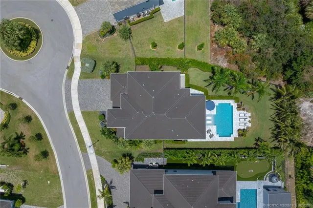 a view of swimming pool with outdoor seating and a patio