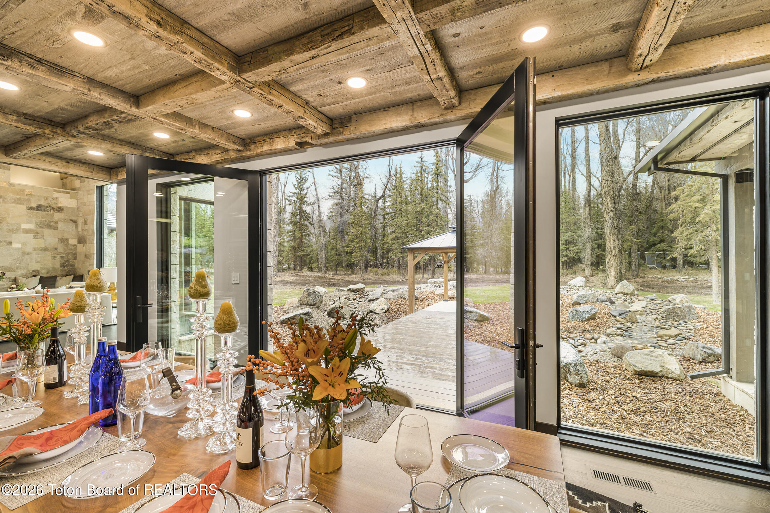 8910 Porter Loop Road Jackson, WY 83001 - Photo 25 of 85 Double Door to Dining Pavillion