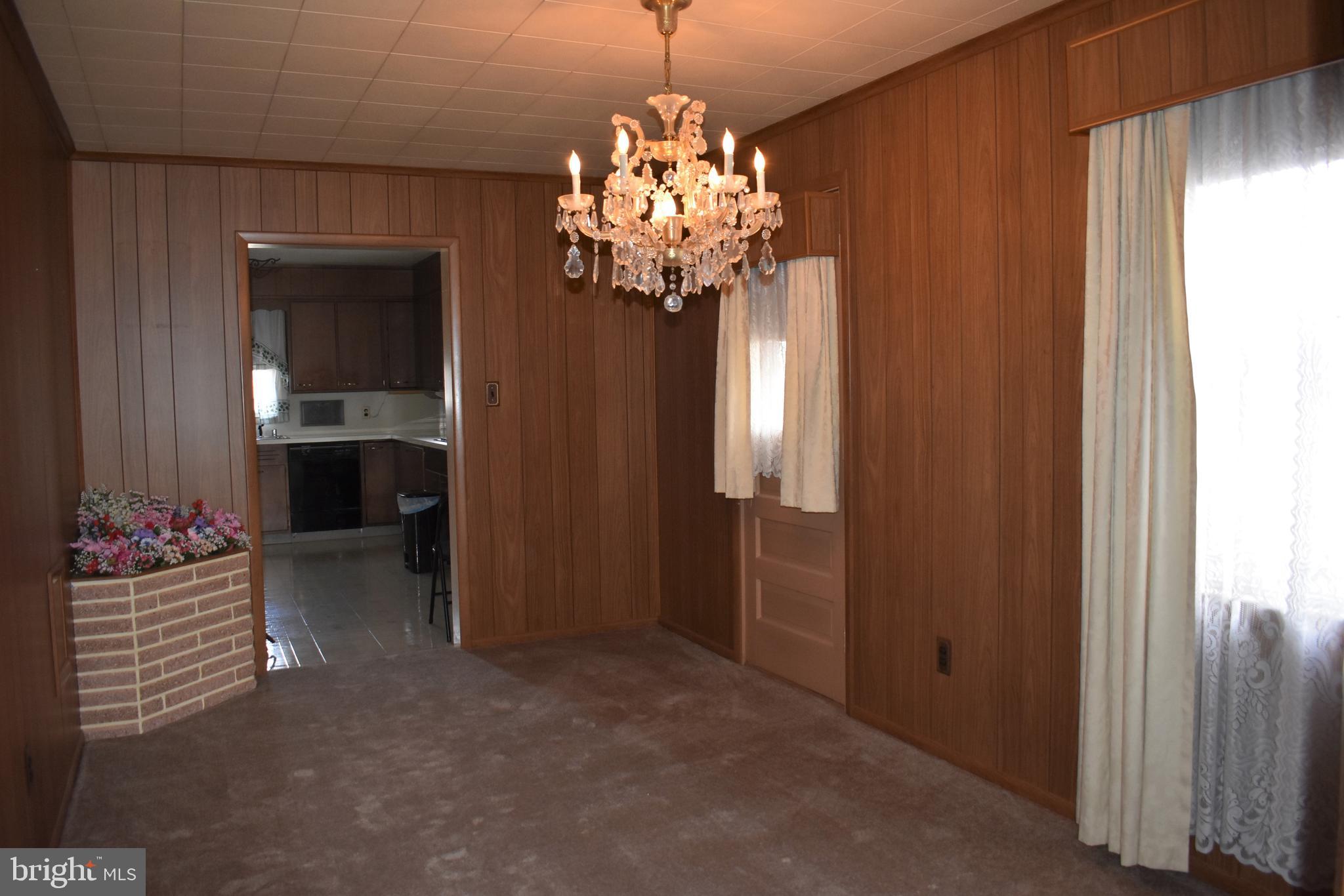 5406 Radecke Avenue Baltimore, MD 21206 - Photo 13 of 33 Dining Room w/Door to Side of Home