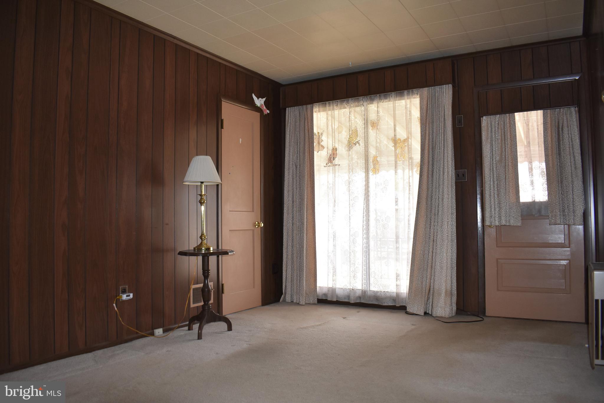 5406 Radecke Avenue Baltimore, MD 21206 - Photo 29 of 33 Family Room w/Door to Covered Patio