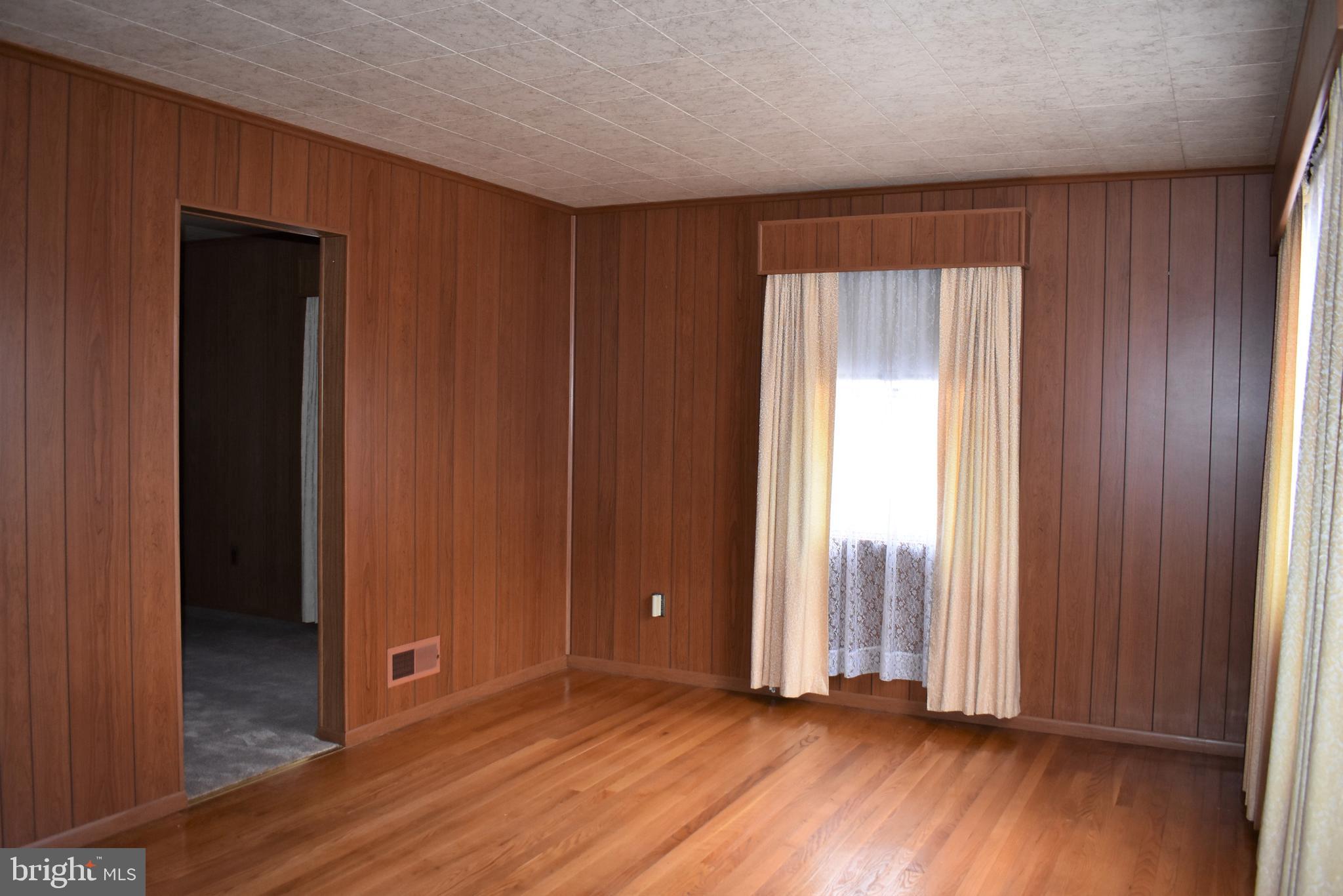 5406 Radecke Avenue Baltimore, MD 21206 - Photo 10 of 33 Living Room leads to Dining Room