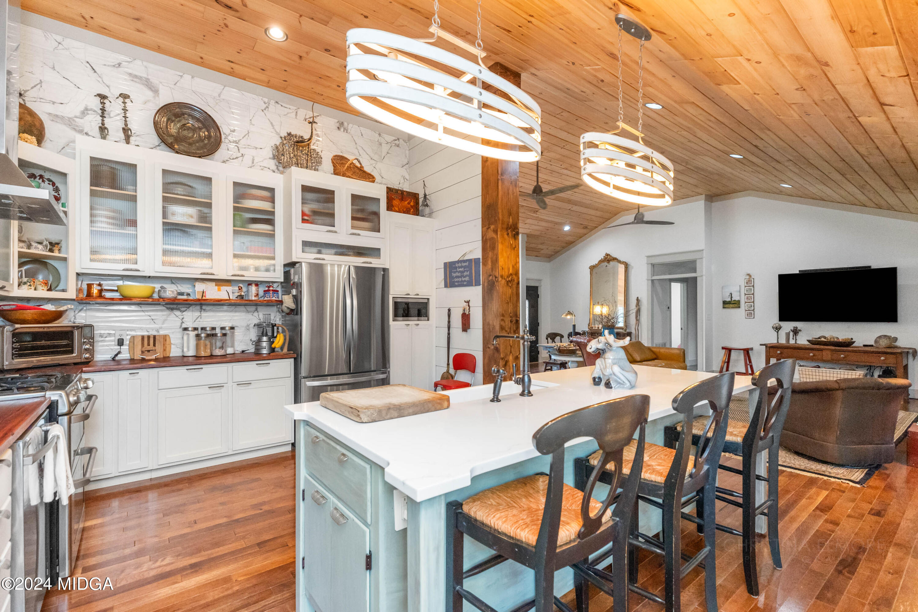362 Stone Edge Road Macon, GA 31210 - Photo 22 of 68 a view of a dining room with furniture and a kitchen