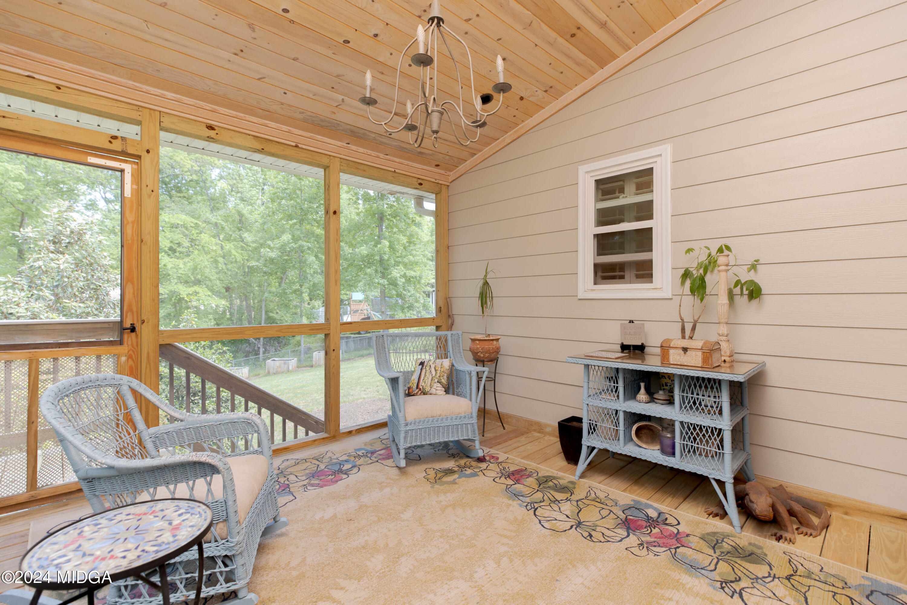 362 Stone Edge Road Macon, GA 31210 - Photo 39 of 68 a view of a workspace with furniture and a window