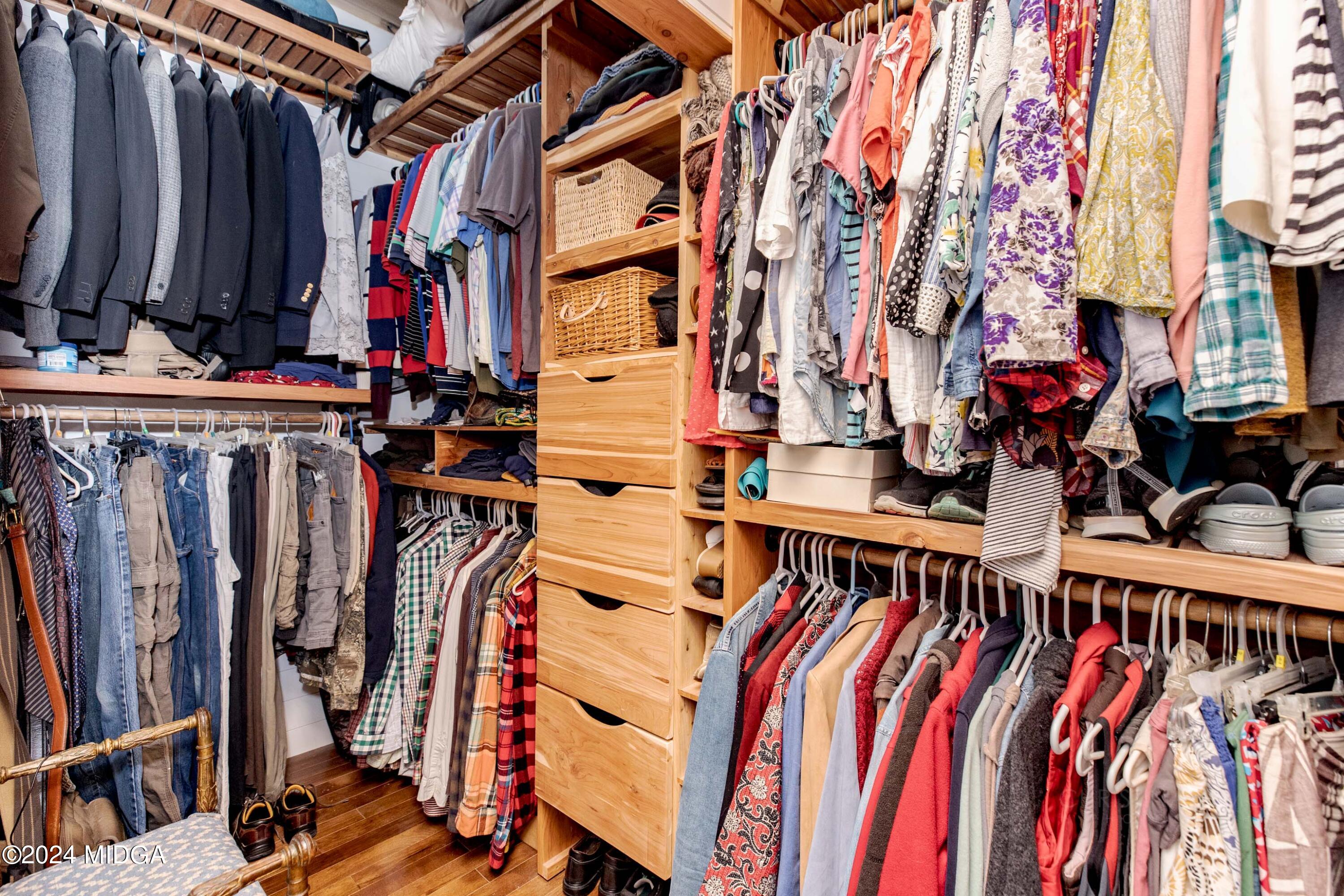 362 Stone Edge Road Macon, GA 31210 - Photo 47 of 68 a view of walk in closet with clothes