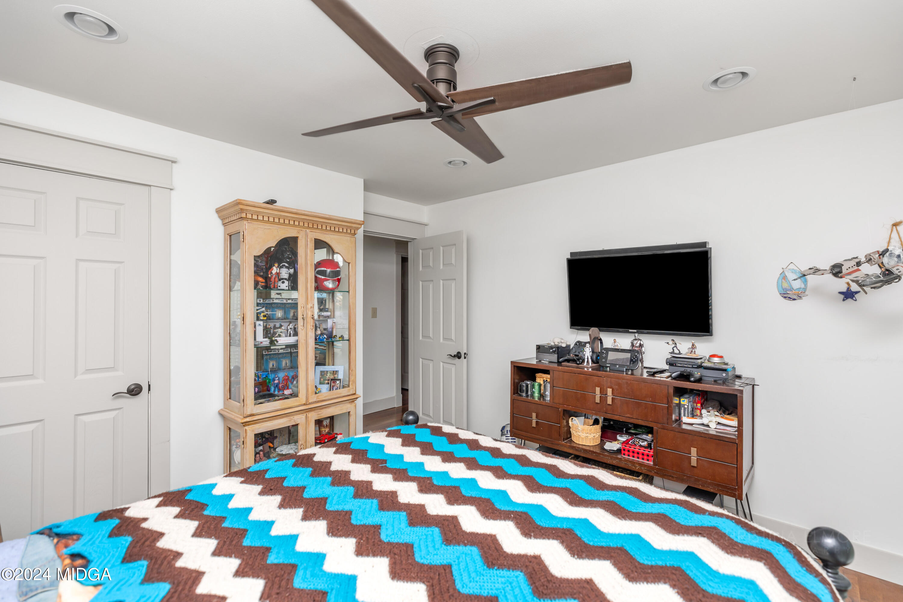 362 Stone Edge Road Macon, GA 31210 - Photo 50 of 68 a bedroom with bed and flat screen tv