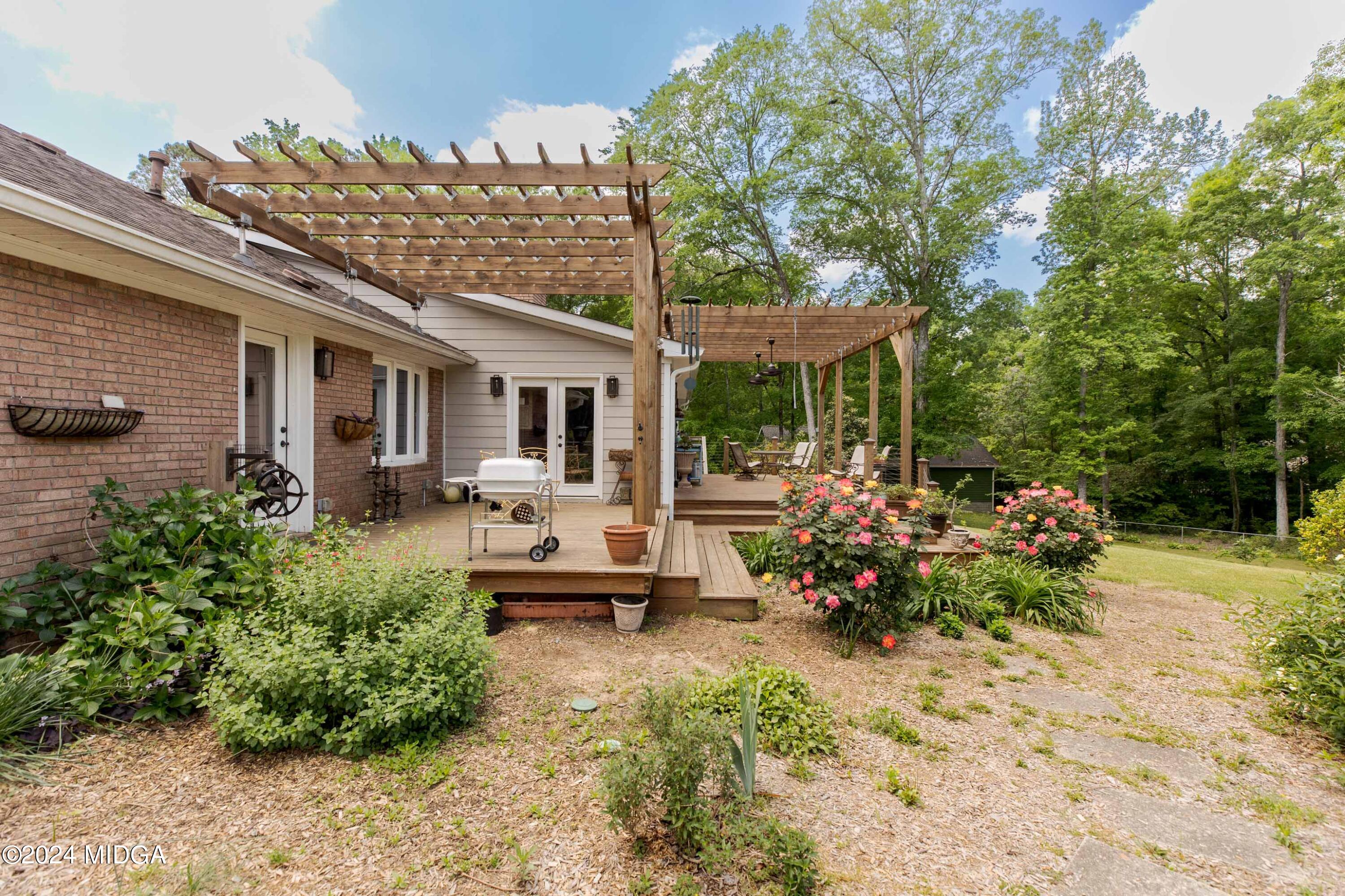 362 Stone Edge Road Macon, GA 31210 - Photo 64 of 68 a view of a house with patio outdoor seating