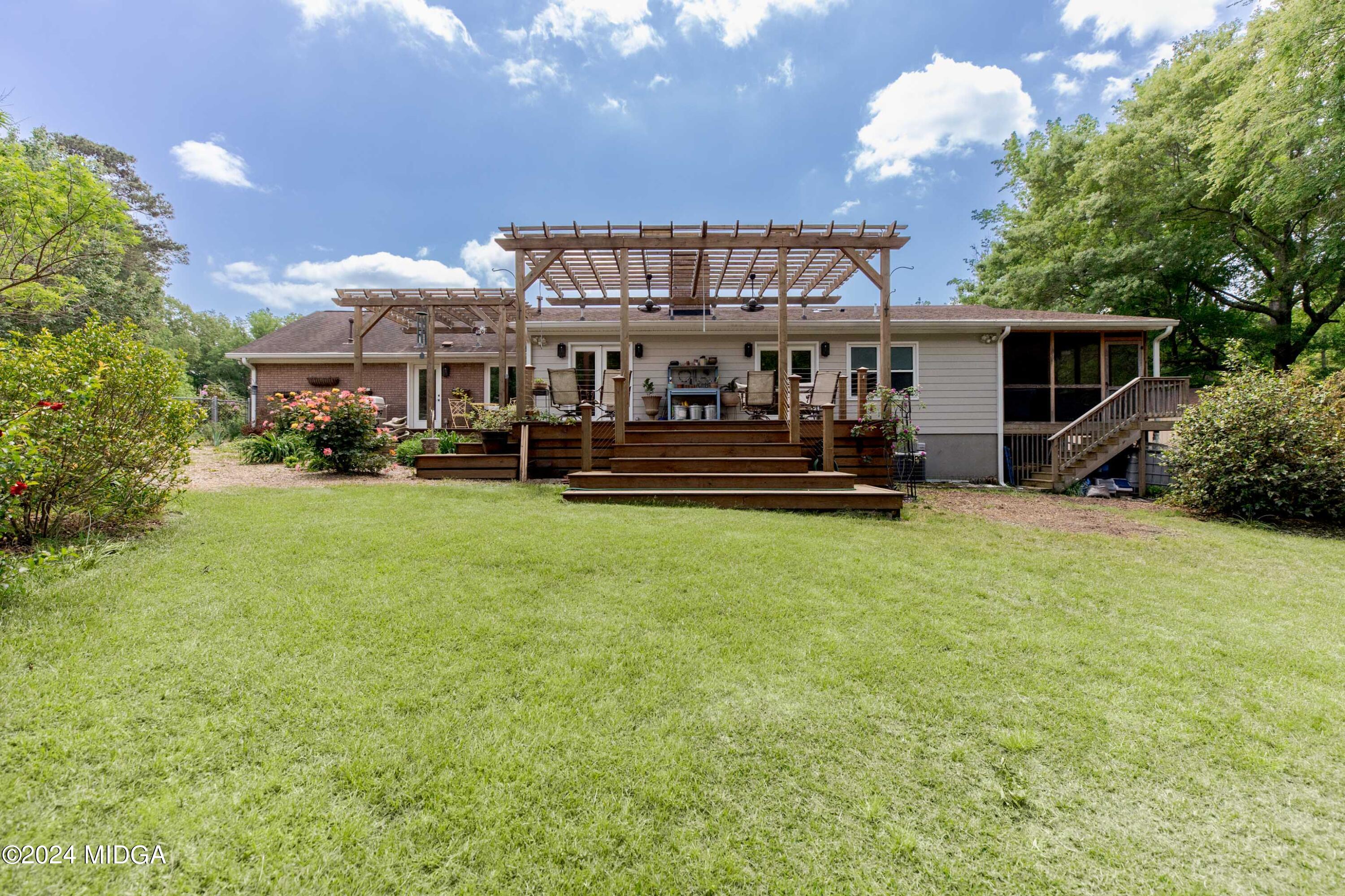 362 Stone Edge Road Macon, GA 31210 - Photo 65 of 68 a view of a house with a big yard and large trees