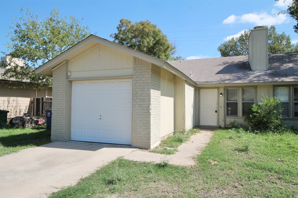 12805 Broughton Way, Unit A Austin, TX 78727 - Photo 1 of 12 a front view of house with yard