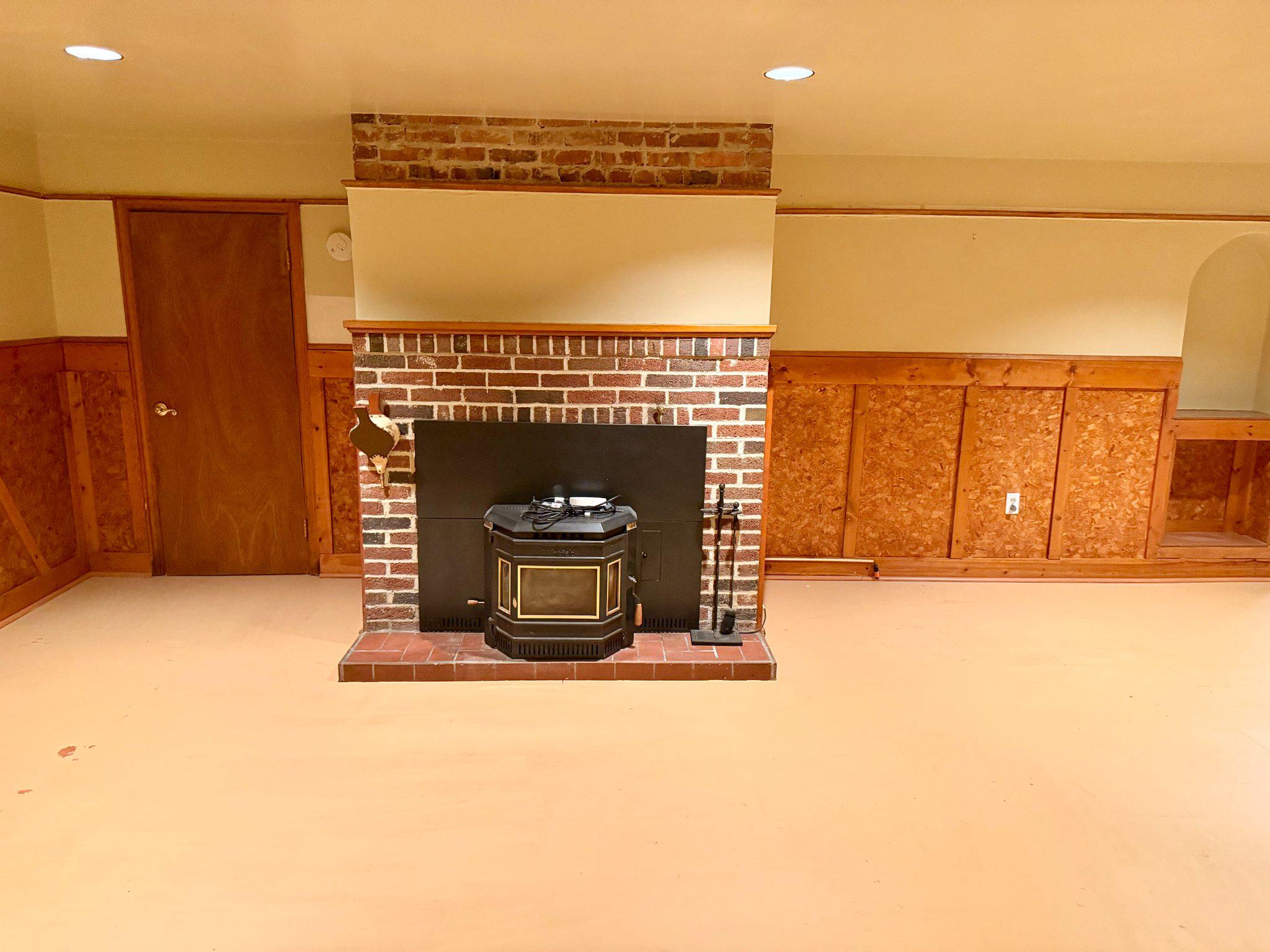 6318 Winner Avenue Baltimore, MD 21215 - Photo 53 of 75 Cozy Pellet fireplace in a spacious basement.