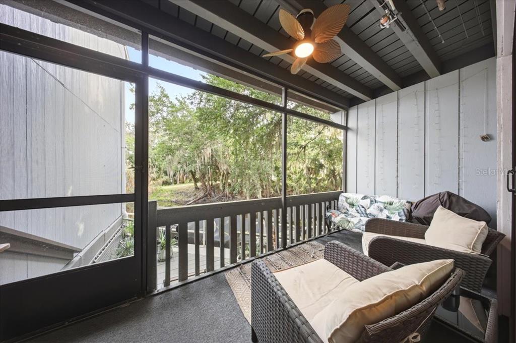 2329 River Ridge Road, Unit 2 DeLand, FL 32720 - Photo 14 of 17 a outdoor living room with furniture