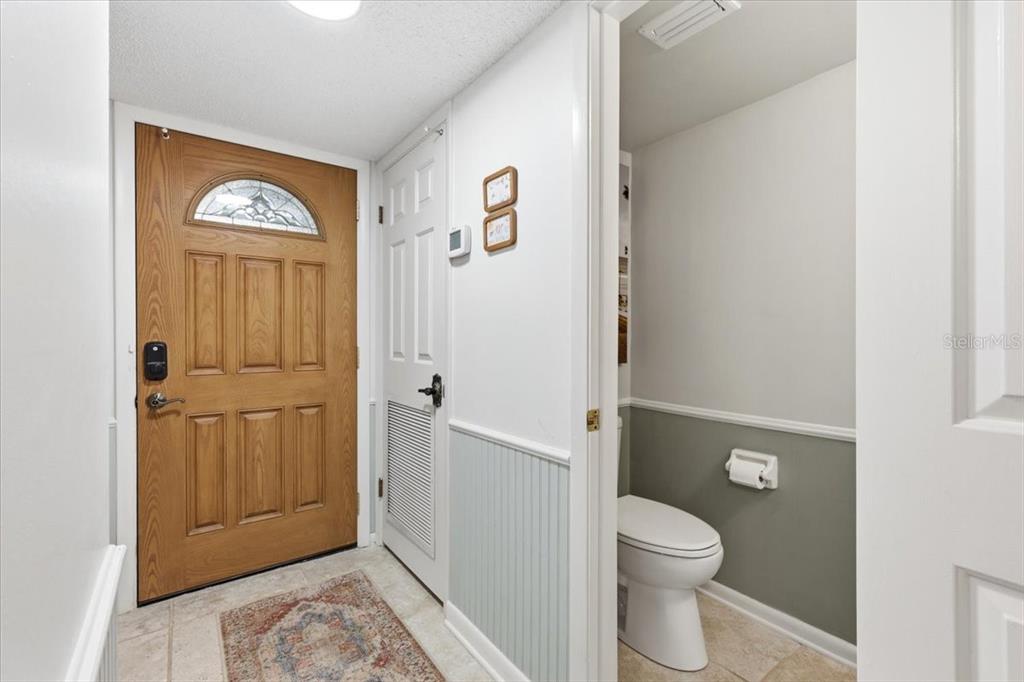 2329 River Ridge Road, Unit 2 DeLand, FL 32720 - Photo 8 of 17 a bathroom with a toilet and a shower