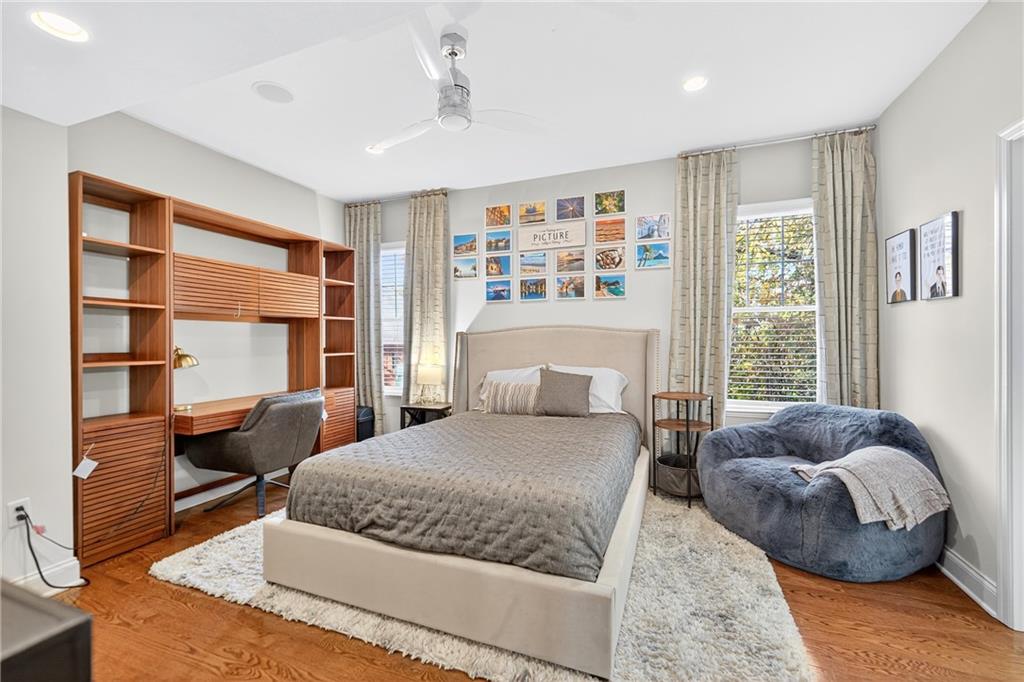 4709 Wallingford Street Pittsburgh, PA 15213 - Photo 18 of 39 a bedroom with a large bed and a window