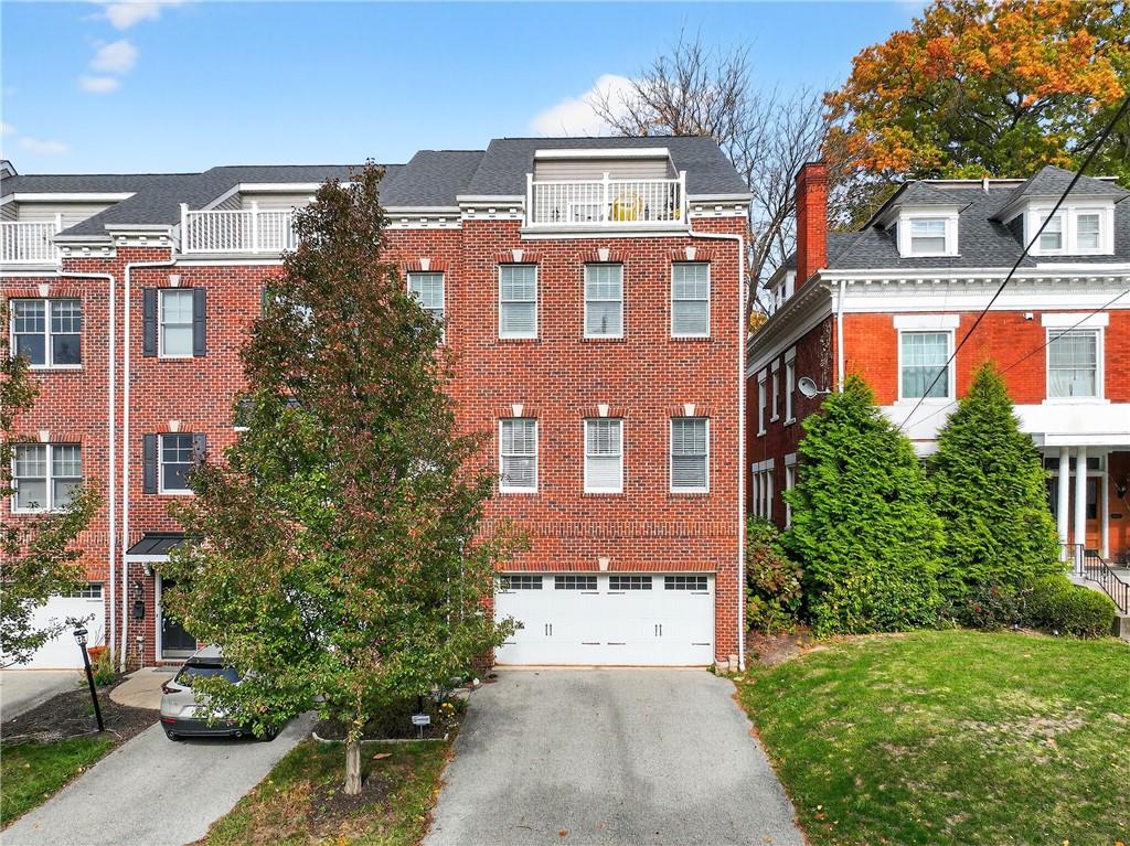 4709 Wallingford Street Pittsburgh, PA 15213 - Photo 2 of 39 a front view of a multi story residential apartment building
