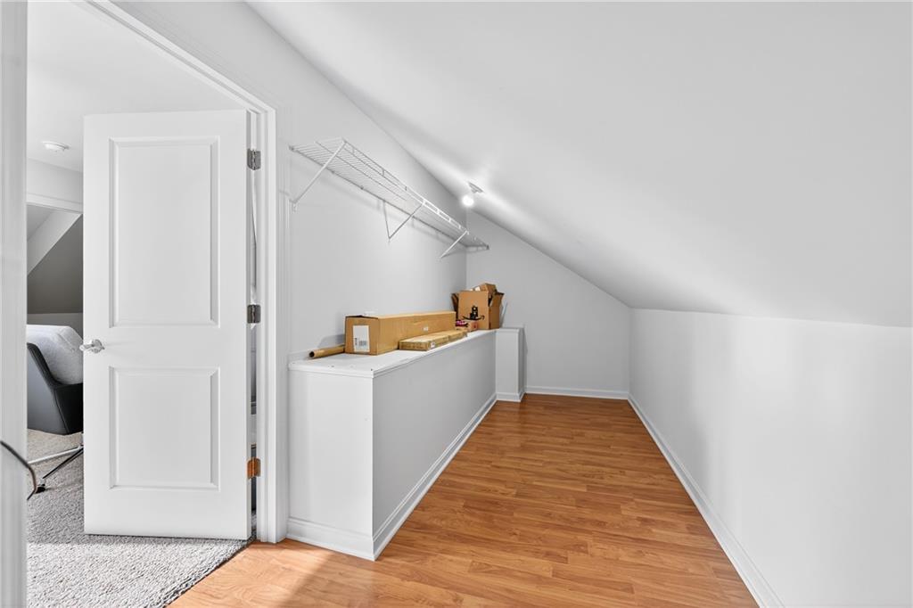 4709 Wallingford Street Pittsburgh, PA 15213 - Photo 27 of 39 a view of a hallway with wooden floor and staircase