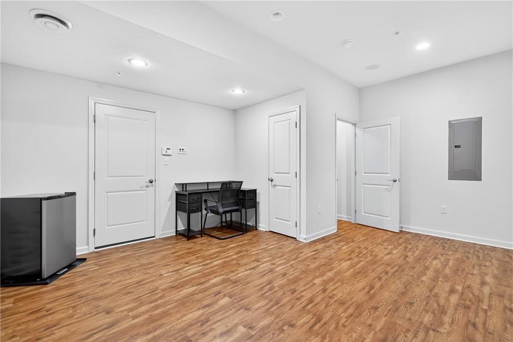 4709 Wallingford Street Pittsburgh, PA 15213 - Photo 30 of 39 a view of empty room with wooden floor and cabinet