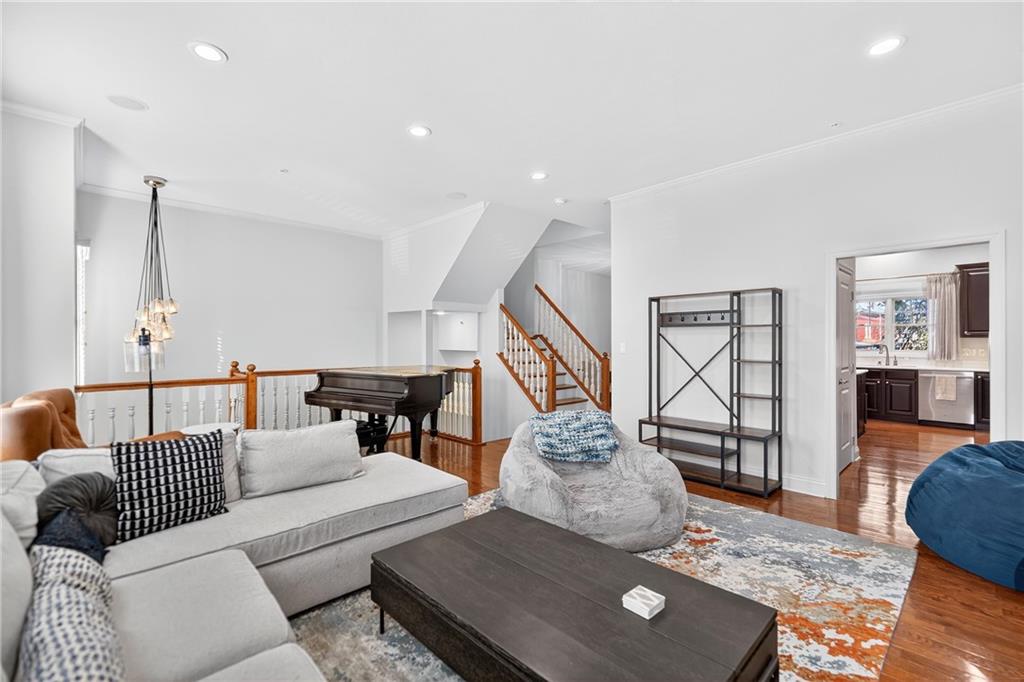 4709 Wallingford Street Pittsburgh, PA 15213 - Photo 3 of 39 a living room with furniture and wooden floor