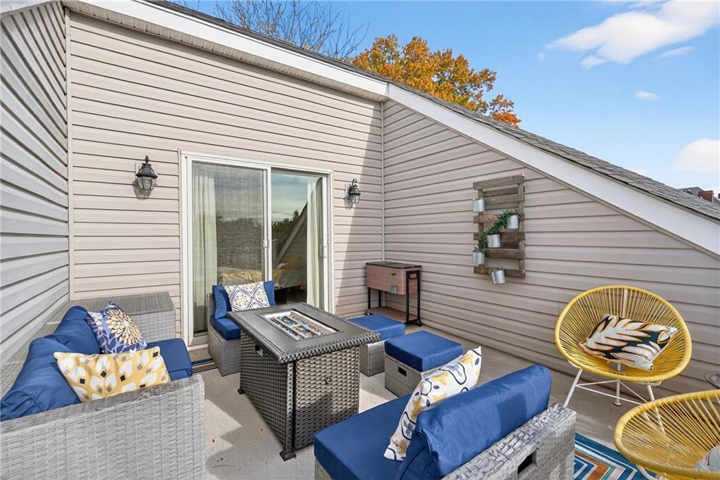 4709 Wallingford Street Pittsburgh, PA 15213 - Photo 32 of 39 a view of a two chairs in front of house