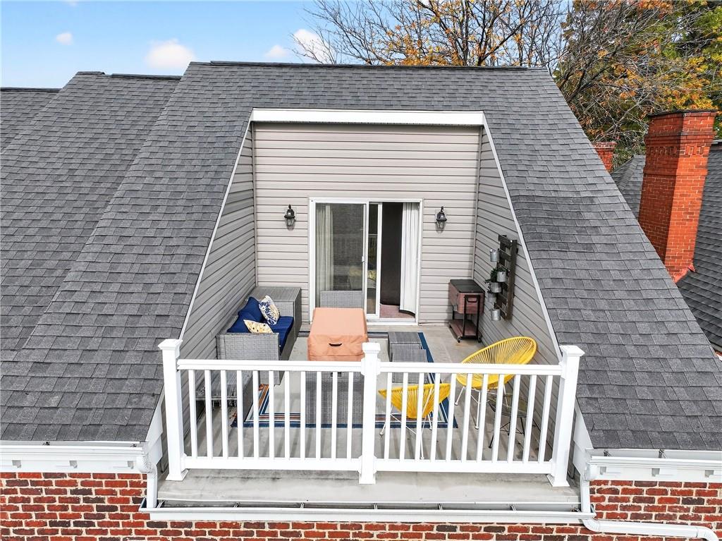 4709 Wallingford Street Pittsburgh, PA 15213 - Photo 34 of 39 a view of a chair and table in the balcony