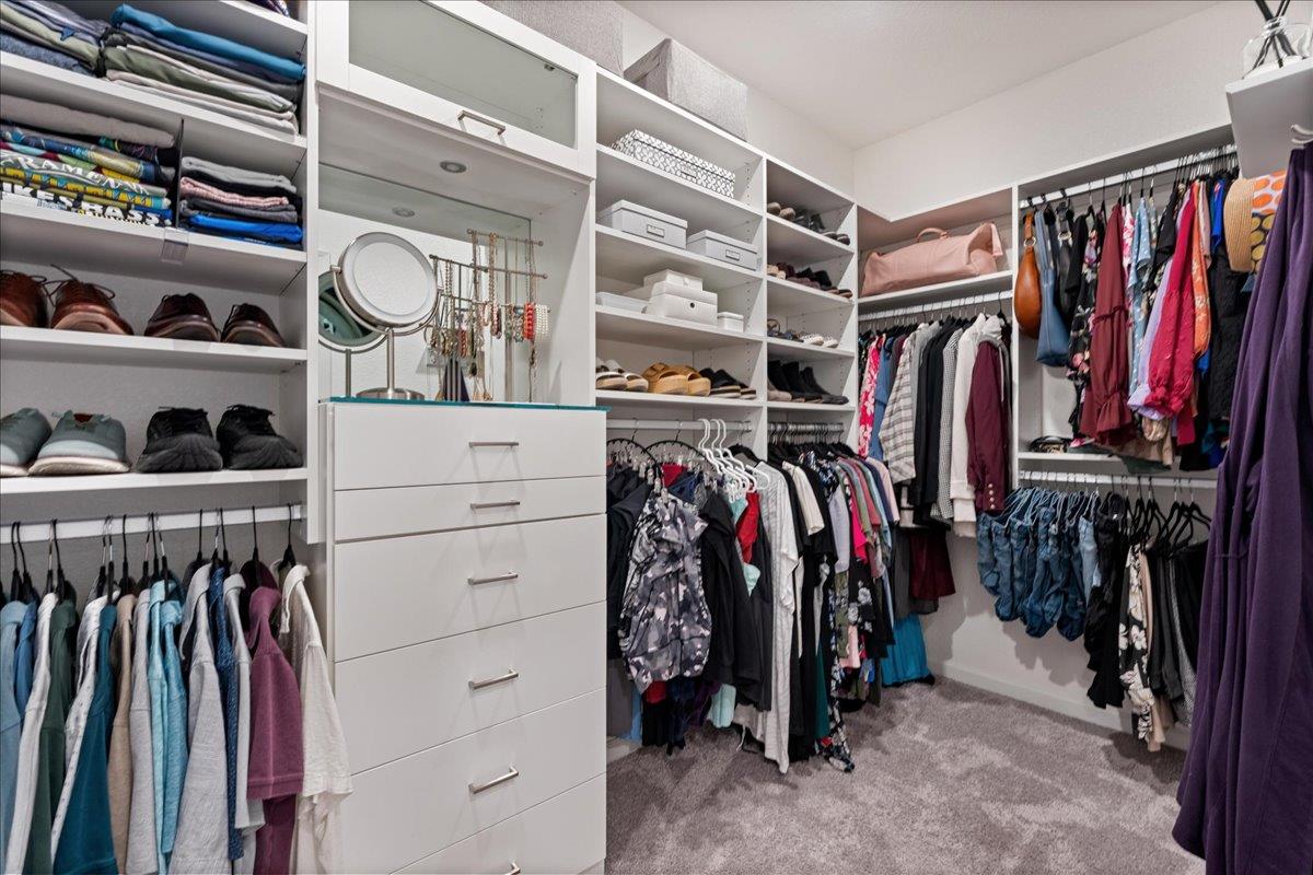 823 Riley Lane Lincoln, CA 95648 - Photo 20 of 52 a view of walk in closet with clothes and shoes