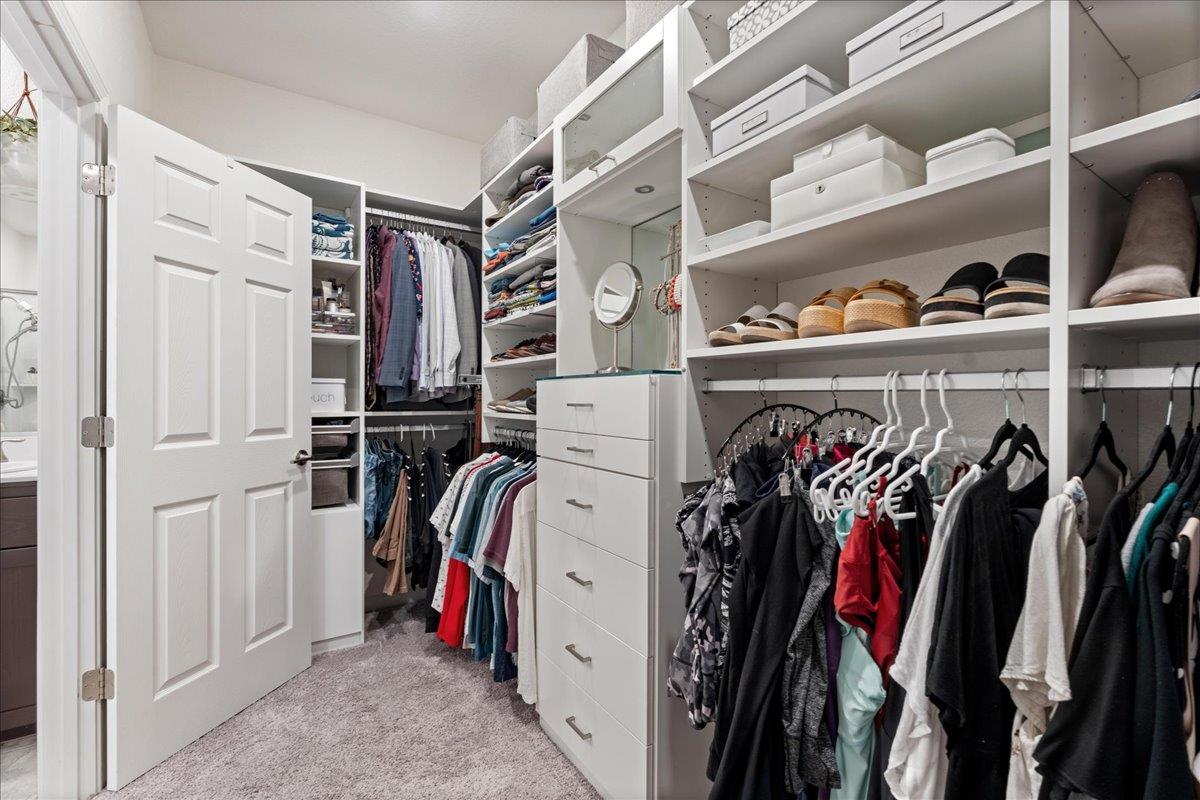 823 Riley Lane Lincoln, CA 95648 - Photo 21 of 52 a view of walk in closet with clothes and shoes