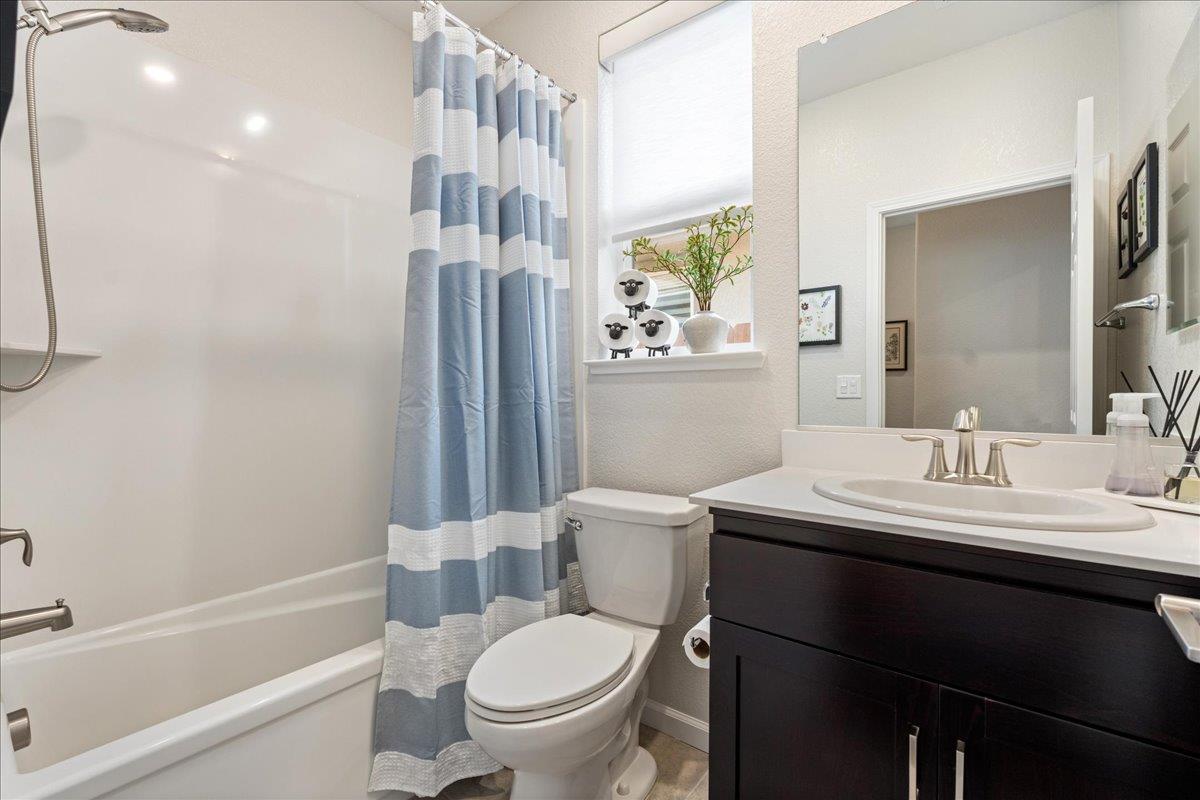 823 Riley Lane Lincoln, CA 95648 - Photo 25 of 52 a bathroom with a sink toilet tub and shower