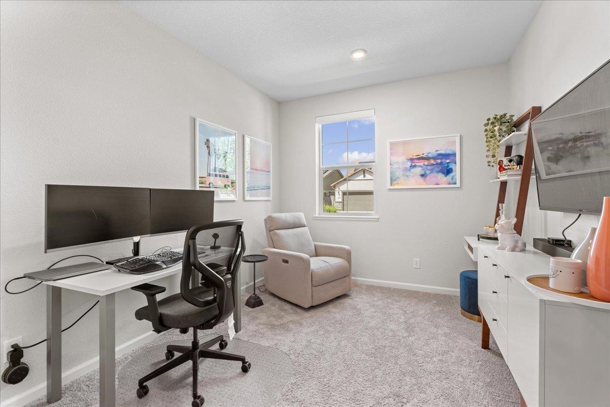 823 Riley Lane Lincoln, CA 95648 - Photo 26 of 52 a view of a workspace with furniture and a window
