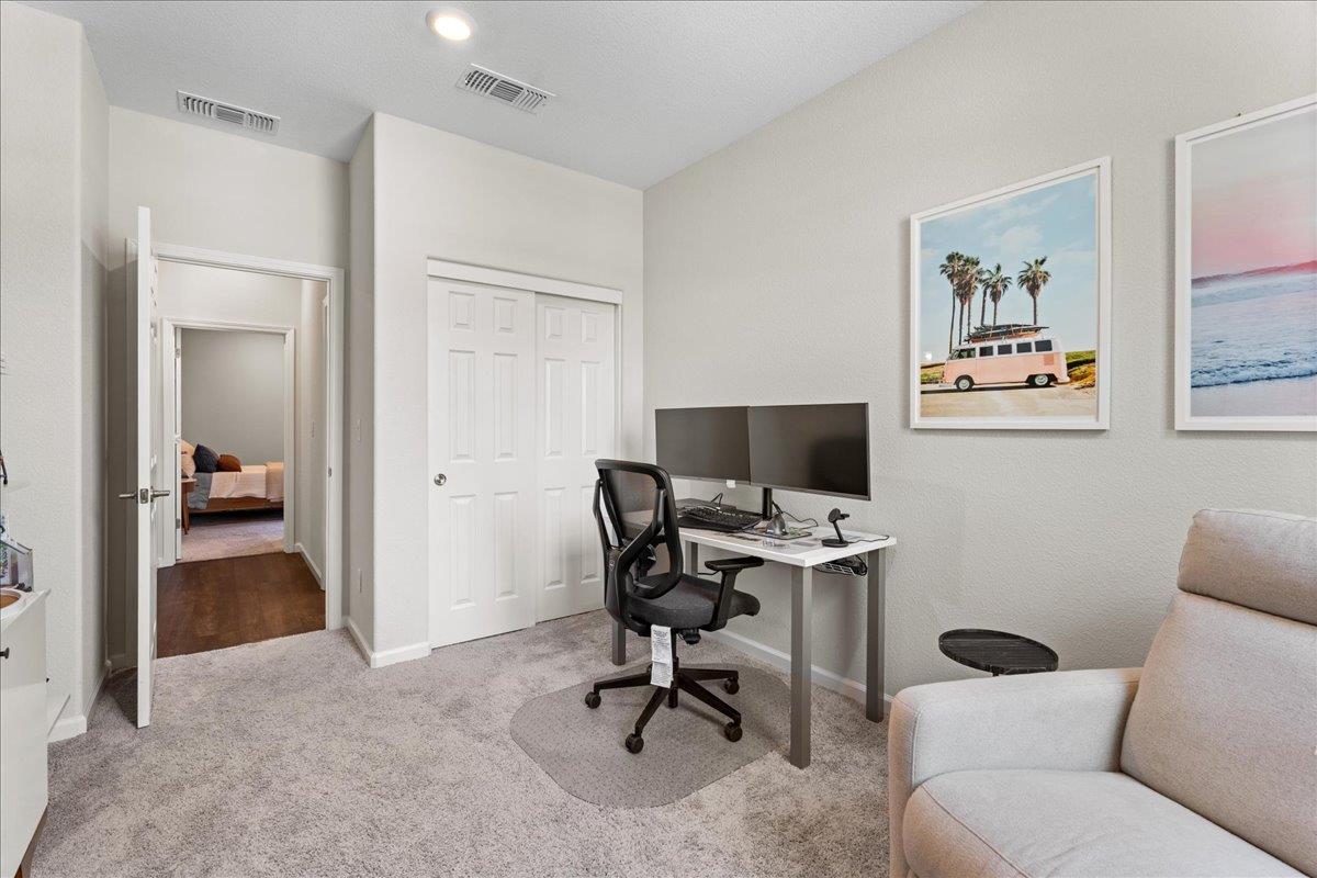 823 Riley Lane Lincoln, CA 95648 - Photo 27 of 52 a view of a livingroom with workspace and a couch