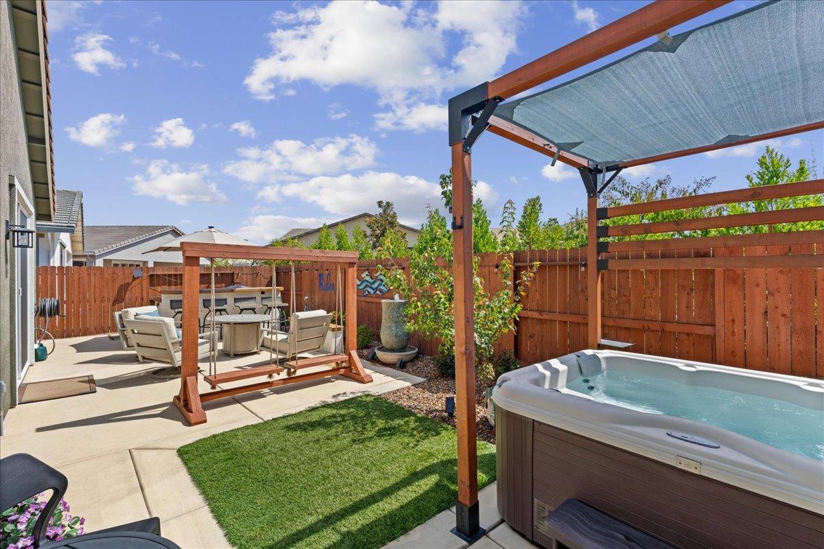 823 Riley Lane Lincoln, CA 95648 - Photo 34 of 52 a view of a backyard with sitting area