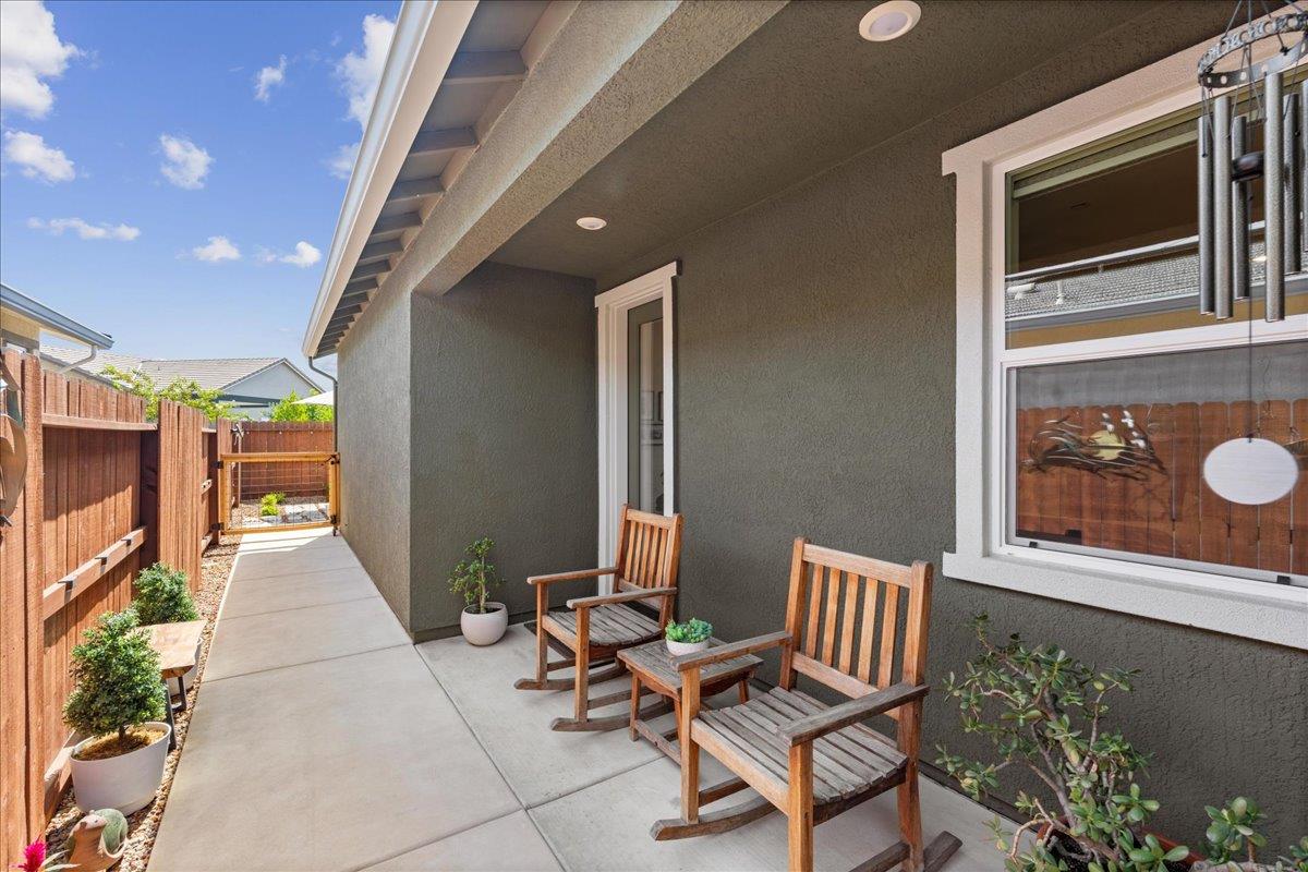 823 Riley Lane Lincoln, CA 95648 - Photo 37 of 52 a building outdoor space with patio furniture and potted plants
