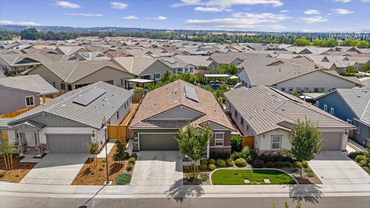 823 Riley Lane Lincoln, CA 95648 - Photo 39 of 52 an aerial view of multiple houses with a yard