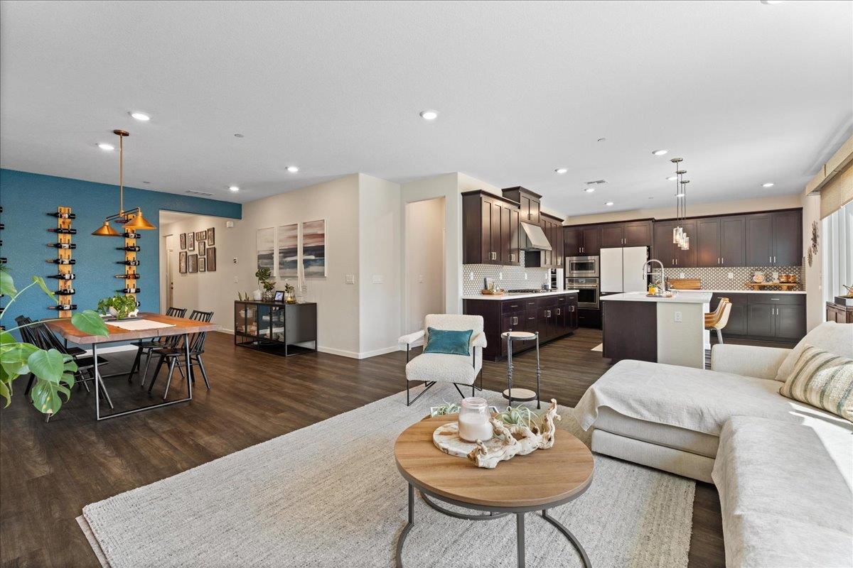 823 Riley Lane Lincoln, CA 95648 - Photo 4 of 52 a living room with furniture kitchen view and a table