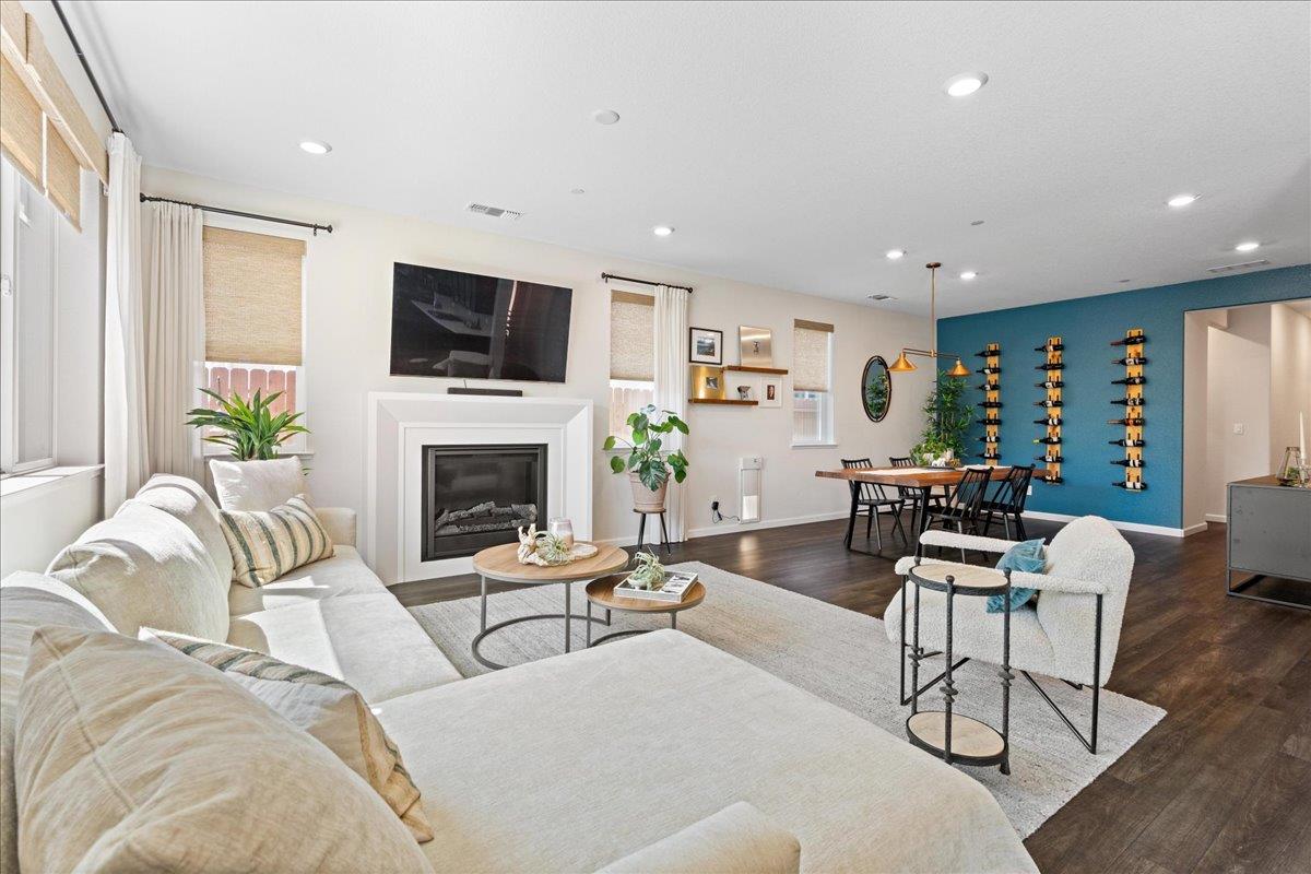 823 Riley Lane Lincoln, CA 95648 - Photo 5 of 52 a living room with furniture fireplace and flat screen tv
