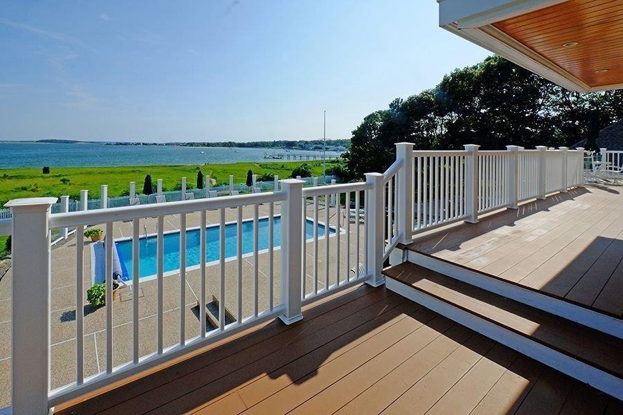 13 Pine Tree Drive Buzzards Bay, MA 02532 - Photo 16 of 30 a view of balcony with wooden floor and fence
