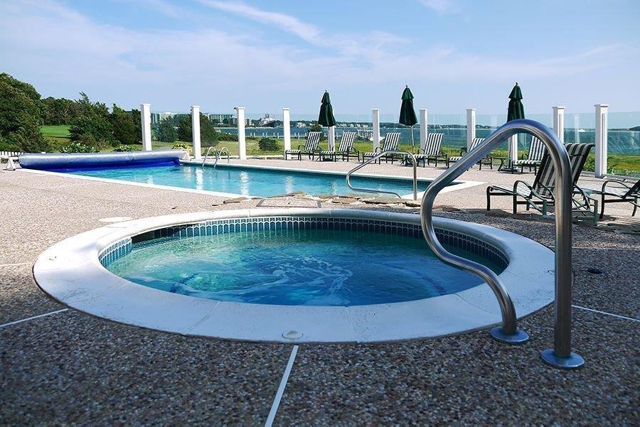 13 Pine Tree Drive Buzzards Bay, MA 02532 - Photo 19 of 30 a view of swimming pool from a dining room