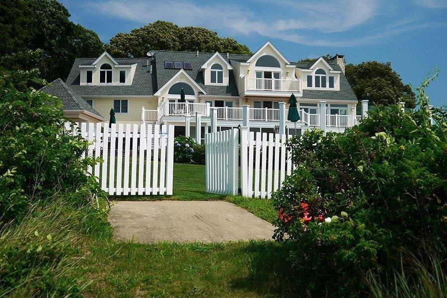 13 Pine Tree Drive Buzzards Bay, MA 02532 - Photo 25 of 30 a front view of a house with a garden