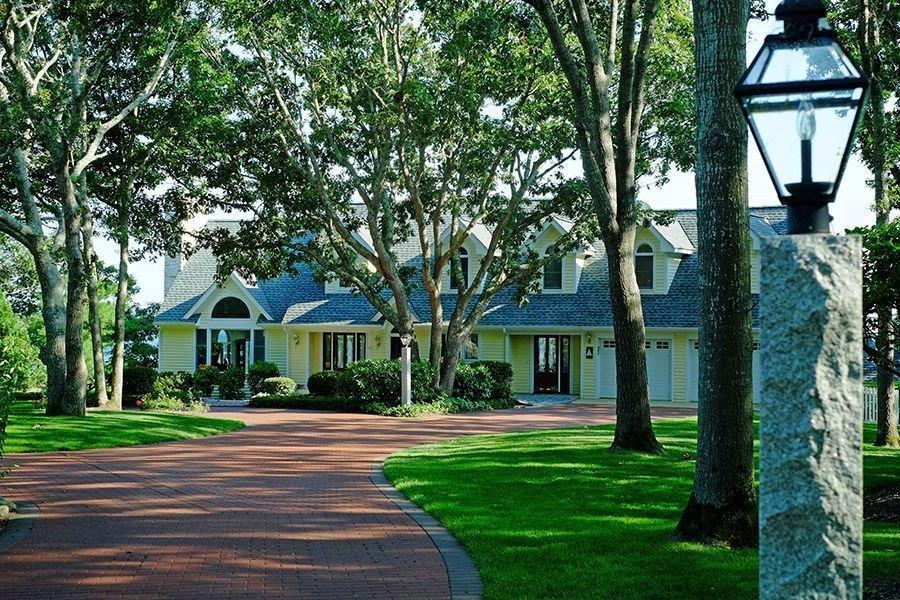 13 Pine Tree Drive Buzzards Bay, MA 02532 - Photo 27 of 30 a front view of a house with garden