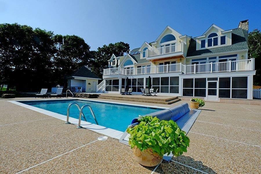 13 Pine Tree Drive Buzzards Bay, MA 02532 - Photo 3 of 30 a front view of a house with swimming pool
