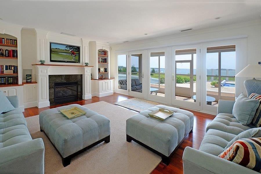 13 Pine Tree Drive Buzzards Bay, MA 02532 - Photo 6 of 30 a living room with furniture and a fireplace